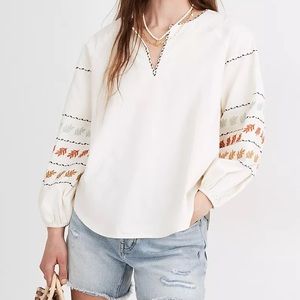 Embroidered sleeve pop-over top